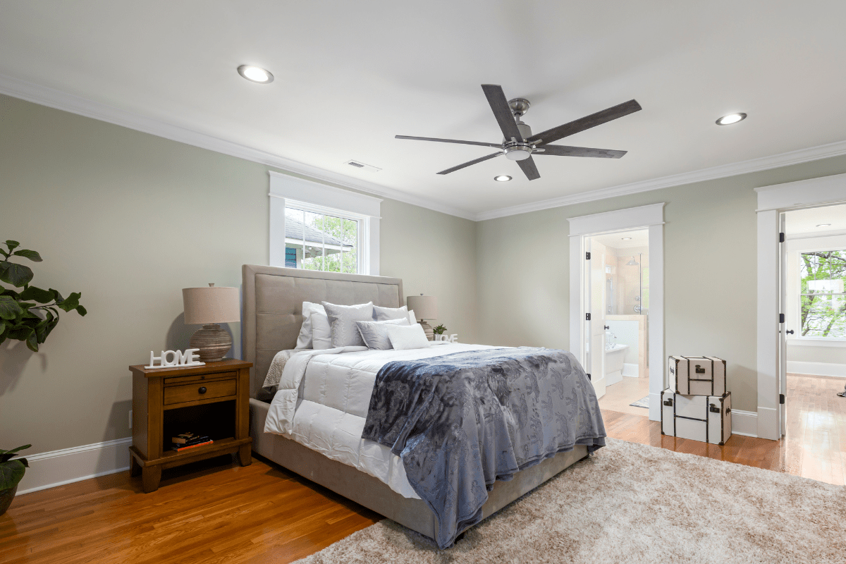 ceiling fan above bed