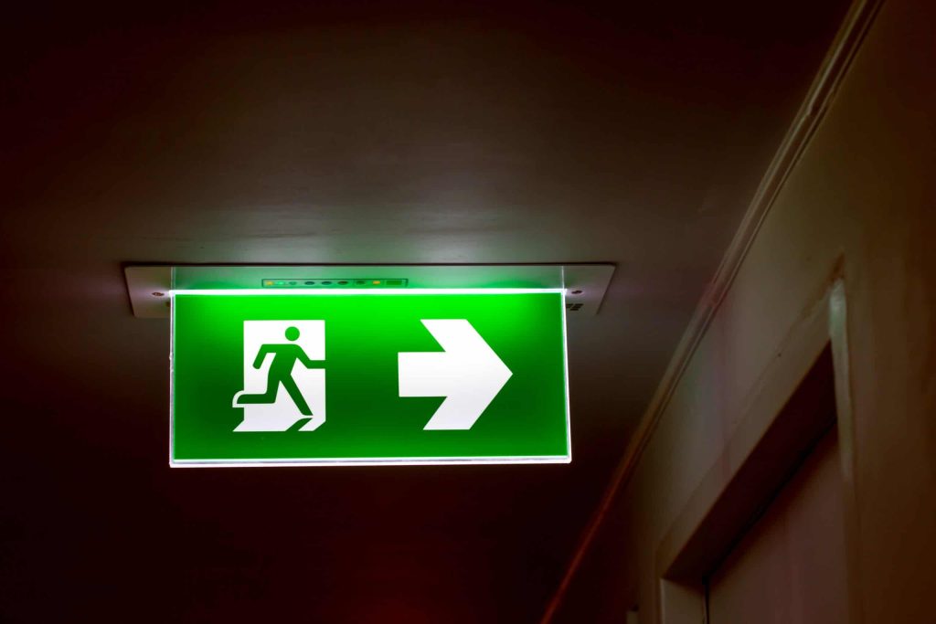 the real safety green sign symbol for go to the fire exit t20 KvJzp1 scaled 1